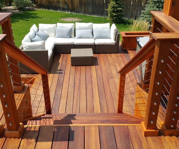 Custom-Decks-tigerwood-deck-planters-cable-rail-tigerwood-posts-top-cap-nana-wall-Greenwood-Village-Colorado
